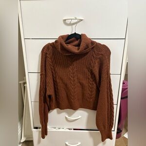 Brown turtleneck sweater